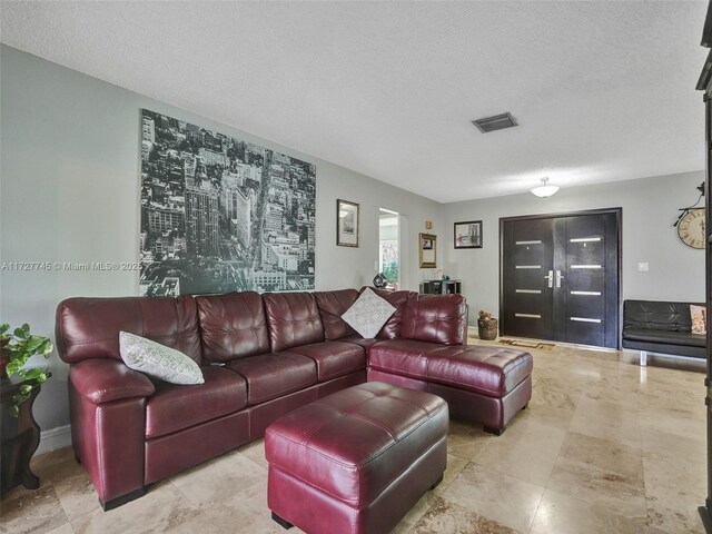 580 Eastwood Ln, Weston, FL 33326 - living room with a textured ceiling and visible vents