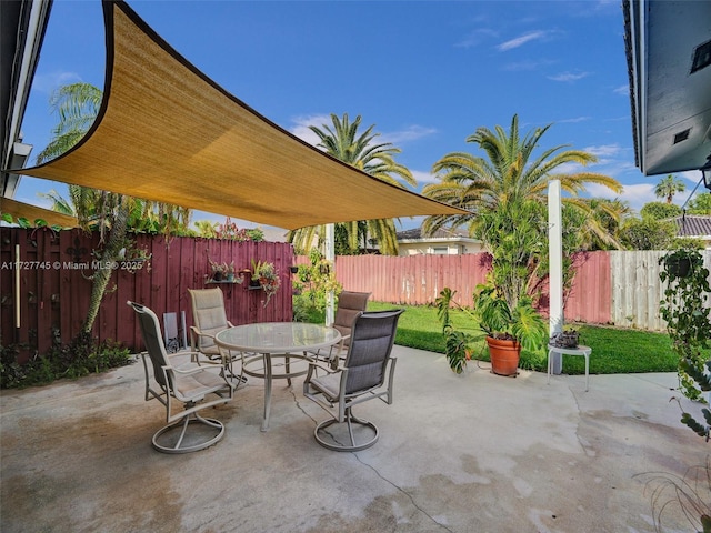 580 Eastwood Ln, Weston, FL 33326 - view of patio / terrace featuring outdoor dining area and a fenced backyard