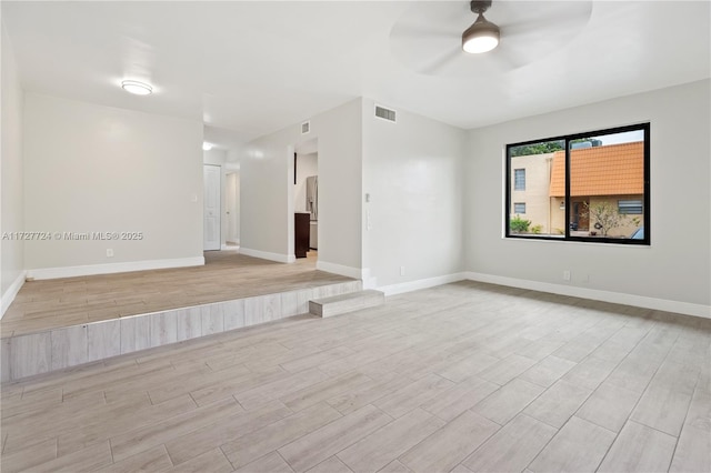 spare room featuring ceiling fan