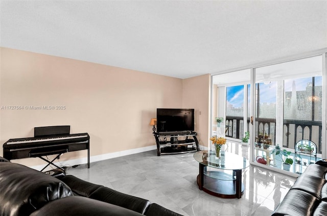 living room with a wall of windows