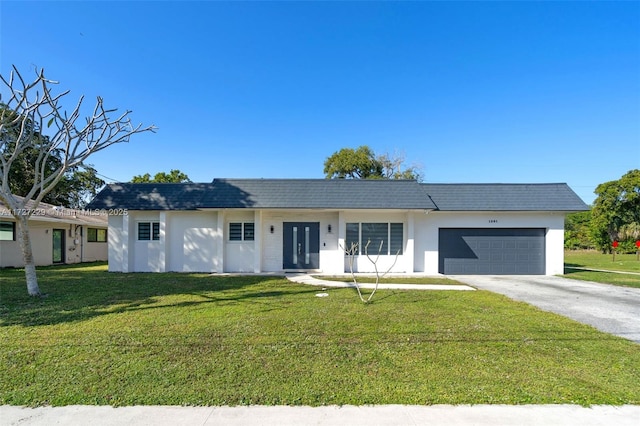 ranch-style house with a front lawn and a garage