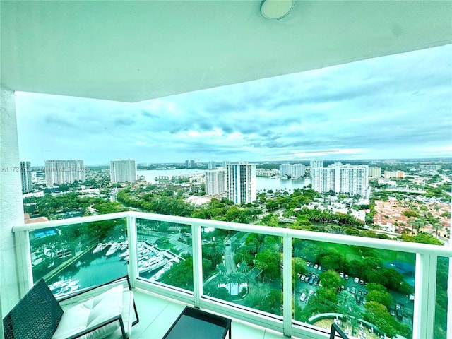 balcony featuring a water view