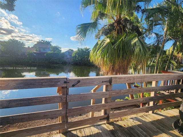 wooden terrace with a water view