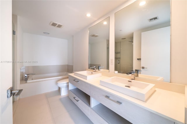 full bathroom featuring toilet, tile patterned flooring, plus walk in shower, and vanity