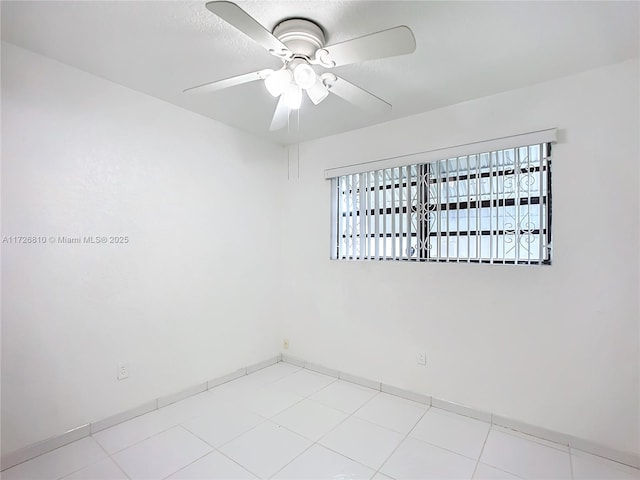 spare room featuring ceiling fan