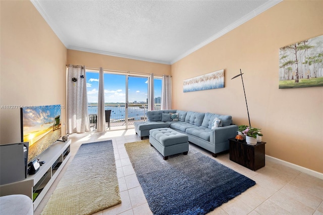 living room with light tile patterned flooring, ornamental molding, and a textured ceiling