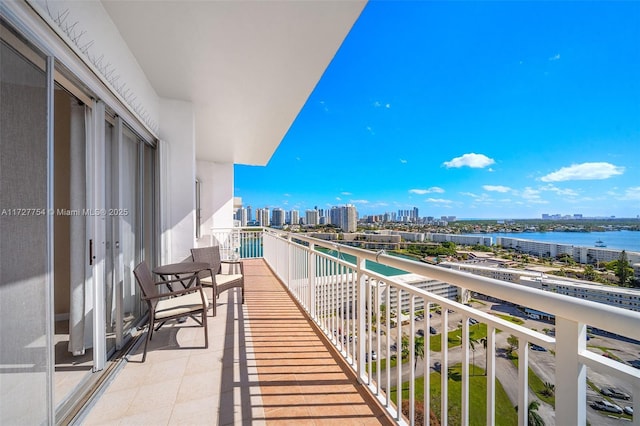 balcony featuring a water view