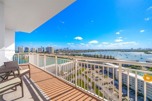 balcony featuring a water view