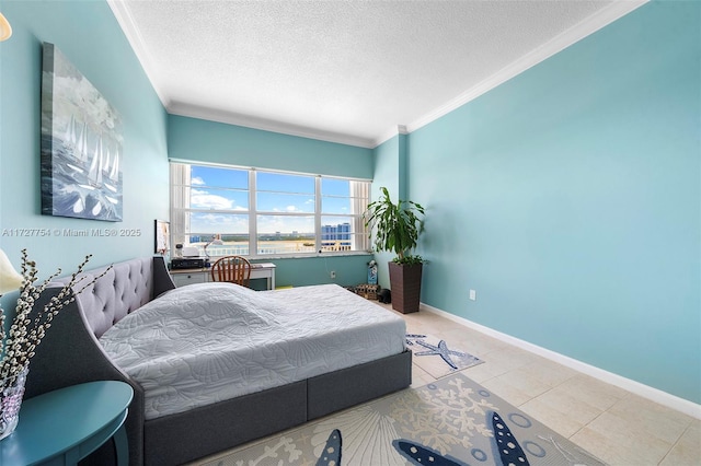 bedroom with crown molding, tile patterned floors, and a textured ceiling