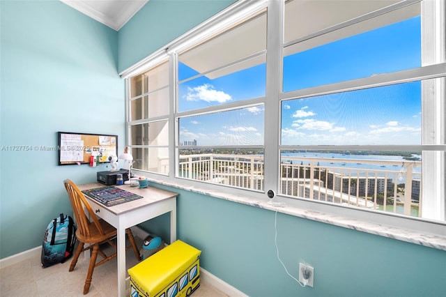 interior space featuring a water view, crown molding, and light tile patterned floors