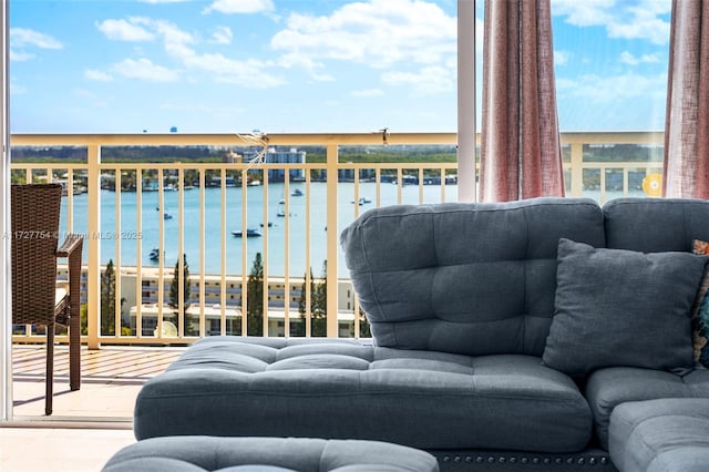 living room featuring a water view