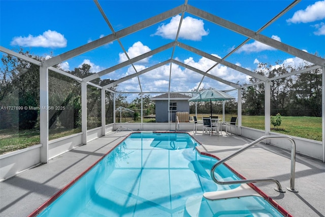 view of swimming pool with a patio area, a lanai, and a gazebo