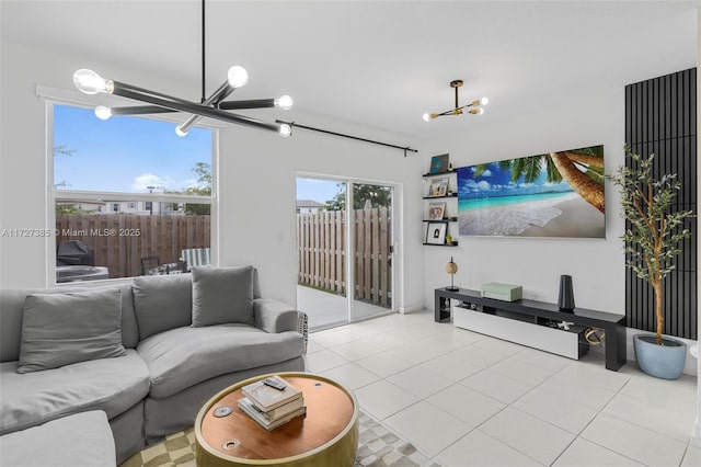 kitchen featuring visible vents, appliances with stainless steel finishes, a kitchen breakfast bar, a peninsula, and light countertops