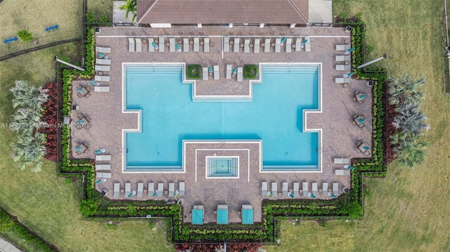 bird's eye view featuring a water view and a residential view