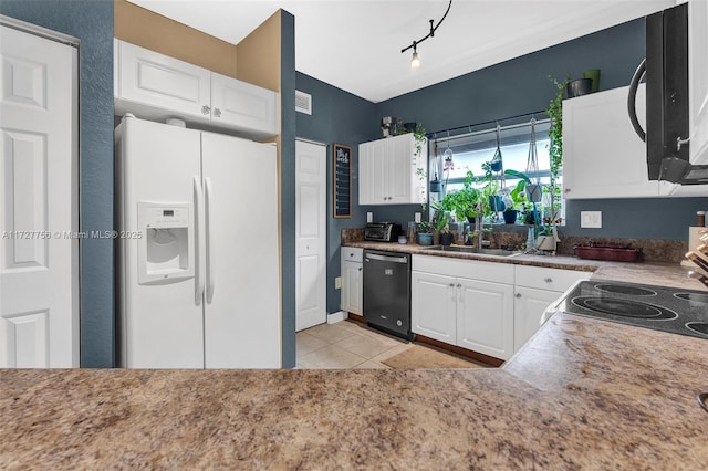 kitchen featuring sink, light tile patterned floors, white cabinetry, track lighting, and black appliances