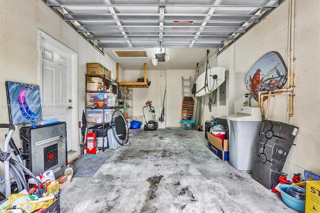 garage featuring electric panel and a garage door opener