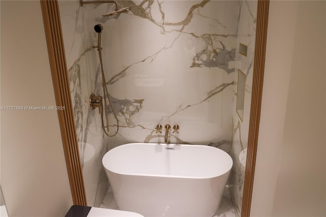 bathroom with a tub to relax in