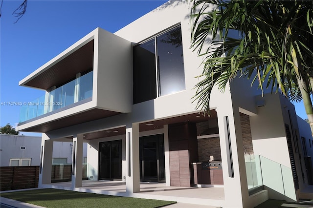 rear view of house featuring a patio area