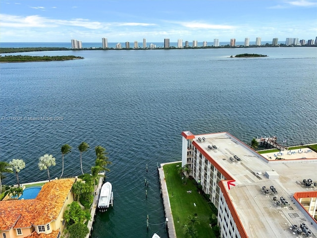 birds eye view of property featuring a water view