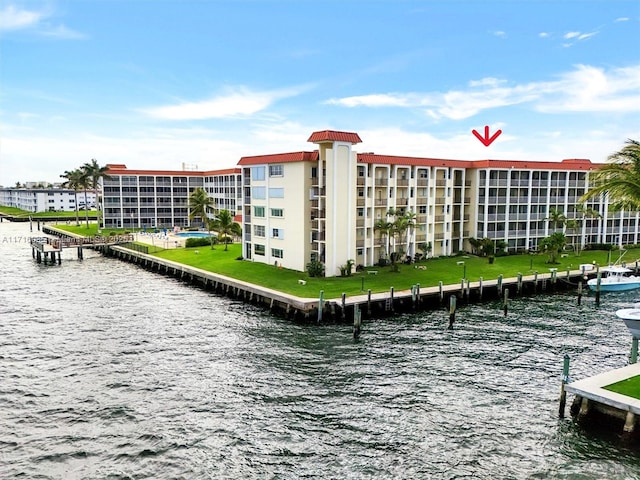 view of building exterior featuring a water view