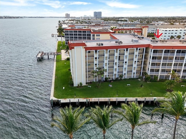 birds eye view of property featuring a water view