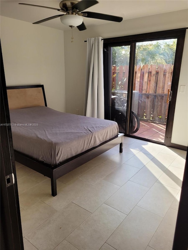 bedroom featuring access to exterior, ceiling fan, and light tile patterned floors