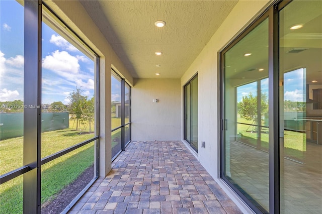 view of unfurnished sunroom