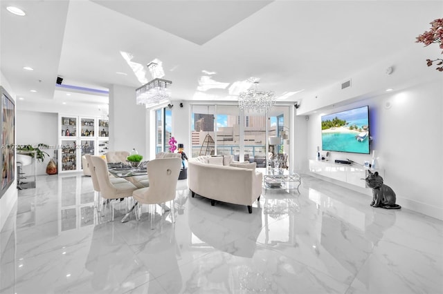 living room featuring an inviting chandelier