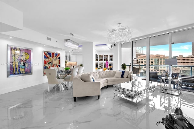 living room with expansive windows and a chandelier