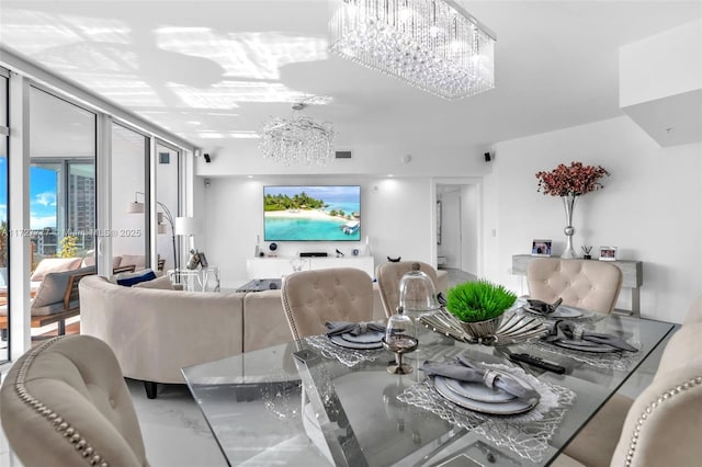 dining area featuring floor to ceiling windows and an inviting chandelier