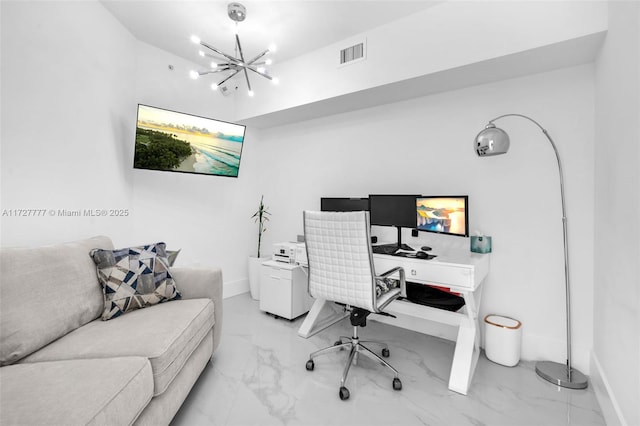 office area with a notable chandelier