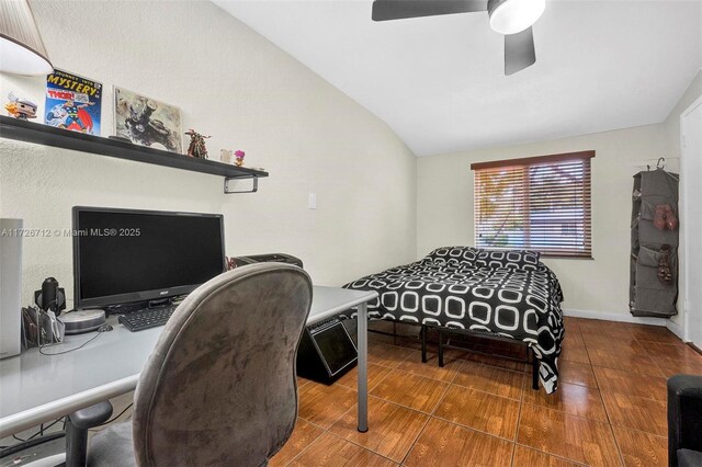 bedroom with lofted ceiling and ceiling fan