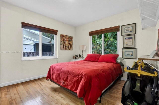 bedroom featuring hardwood / wood-style flooring