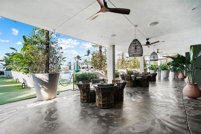 view of patio with ceiling fan