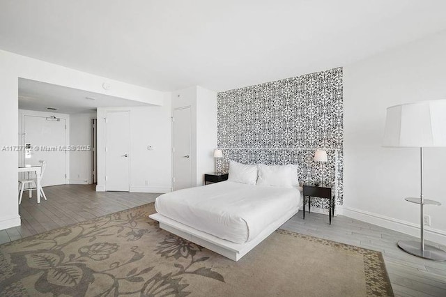 bedroom featuring hardwood / wood-style flooring