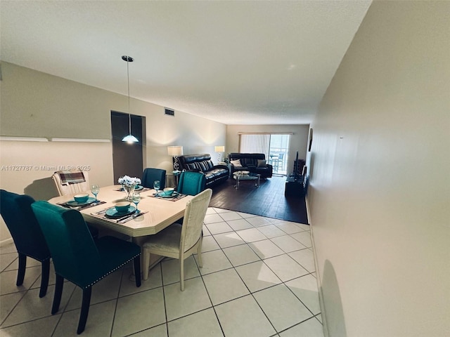 view of tiled dining space