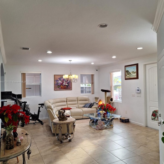 living room featuring crown molding, a notable chandelier, recessed lighting, and visible vents