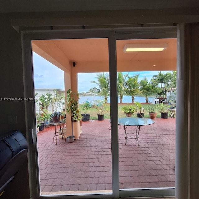 view of patio / terrace featuring a water view