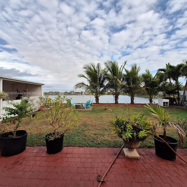 view of patio / terrace featuring a water view