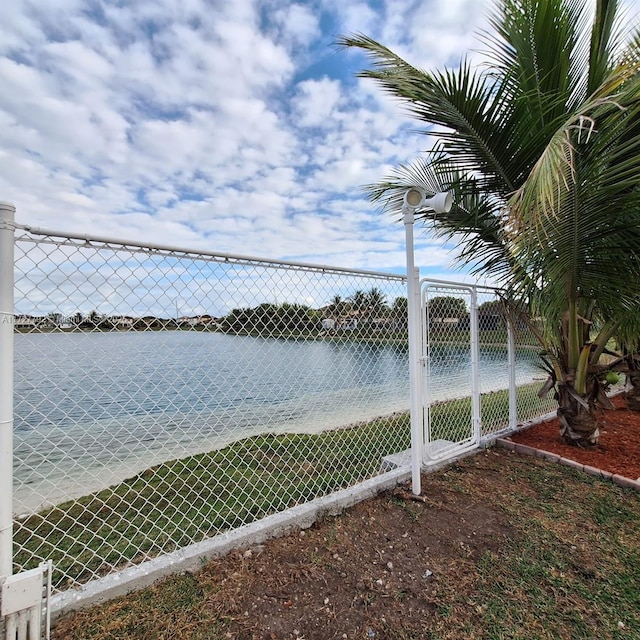 view of water feature featuring fence