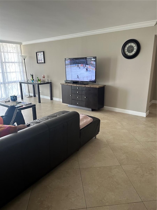 living room with crown molding and light tile patterned flooring