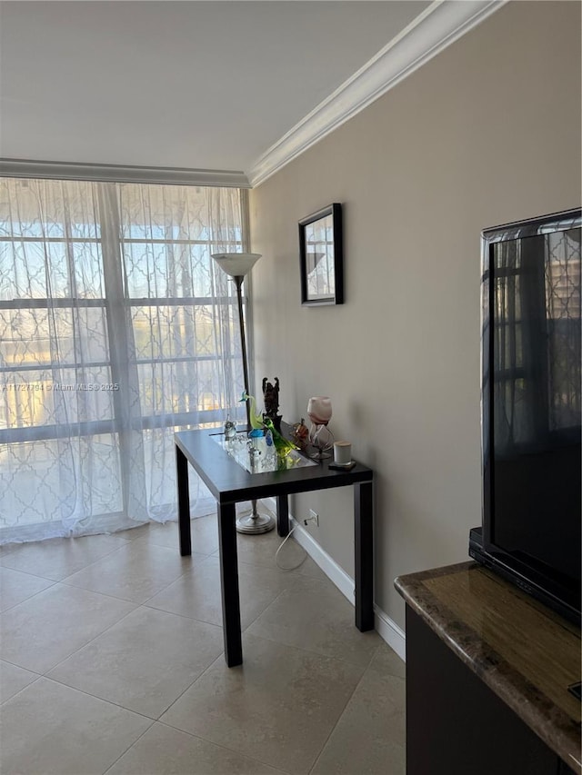 office with crown molding, a wealth of natural light, floor to ceiling windows, and light tile patterned flooring