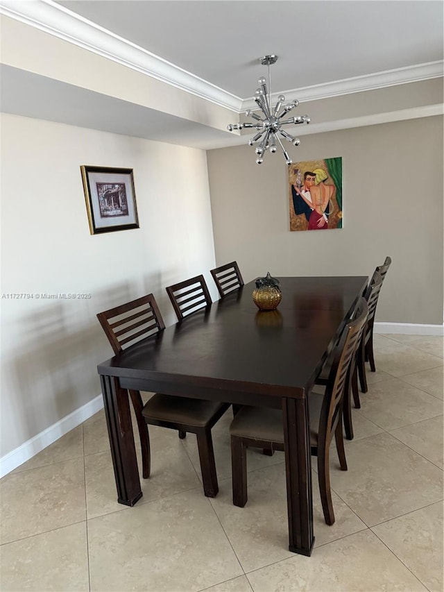 dining area with an inviting chandelier, light tile patterned floors, and ornamental molding