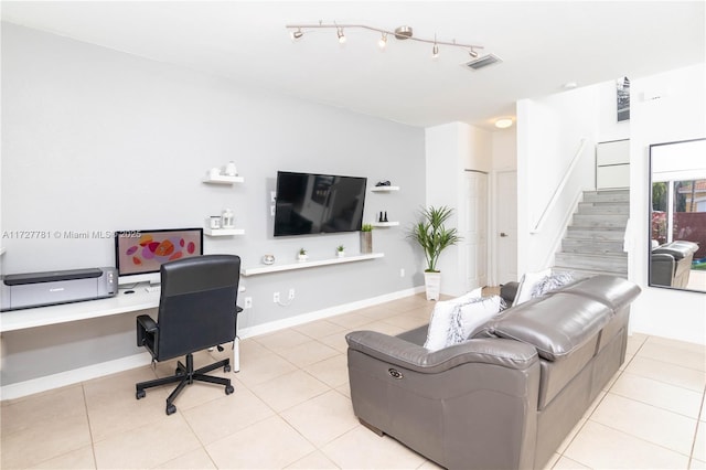 living room with light tile patterned floors