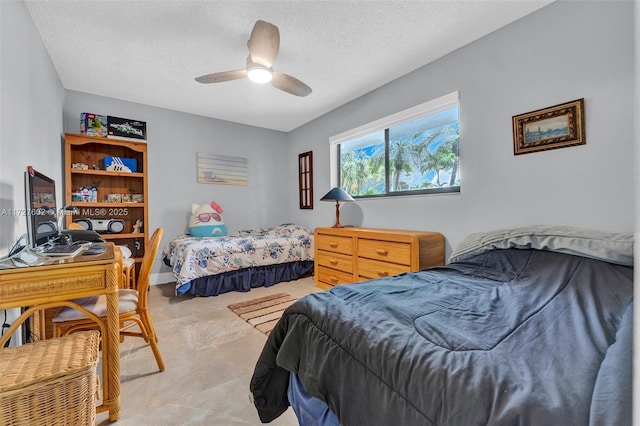 bedroom with a textured ceiling and ceiling fan