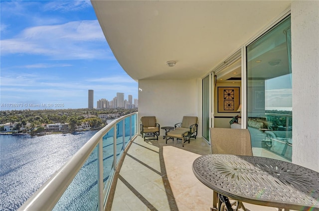 balcony featuring a water view