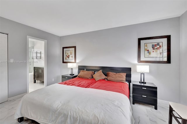 bedroom featuring connected bathroom