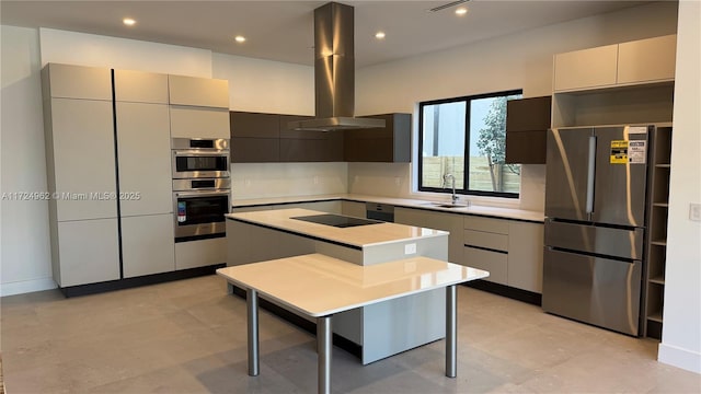 kitchen with a center island, sink, gray cabinetry, stainless steel appliances, and island range hood