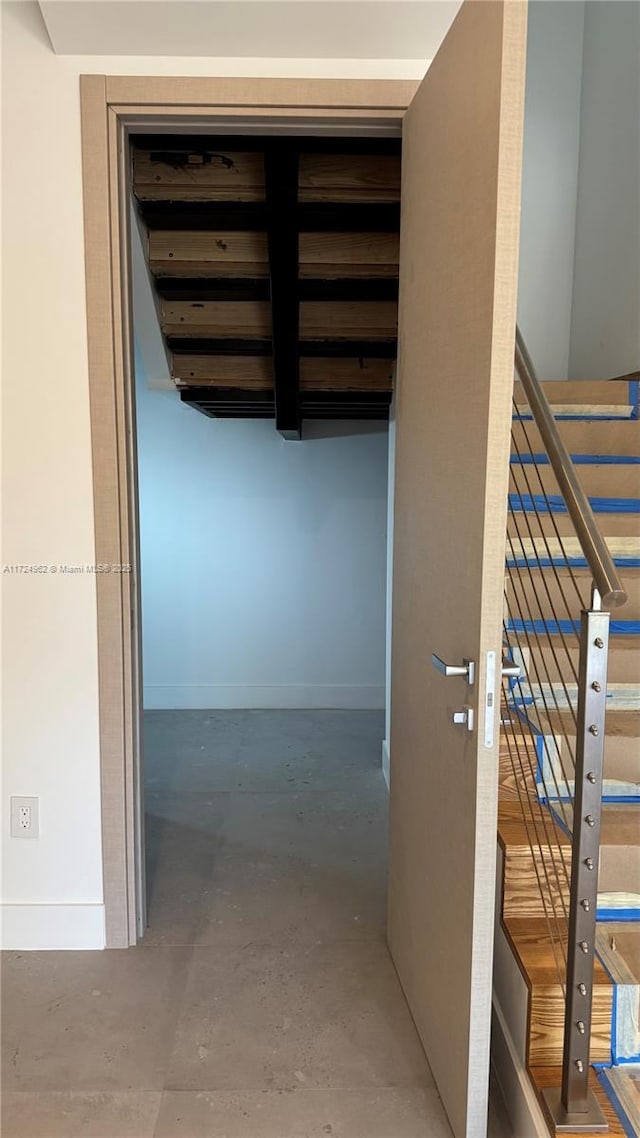 corridor featuring concrete flooring