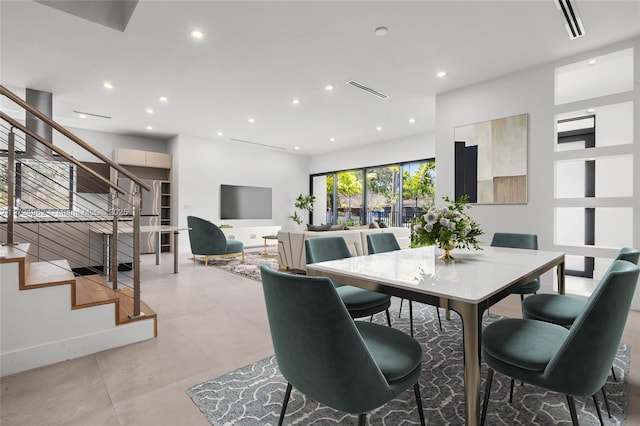 dining room featuring recessed lighting, stairway, visible vents, and baseboards
